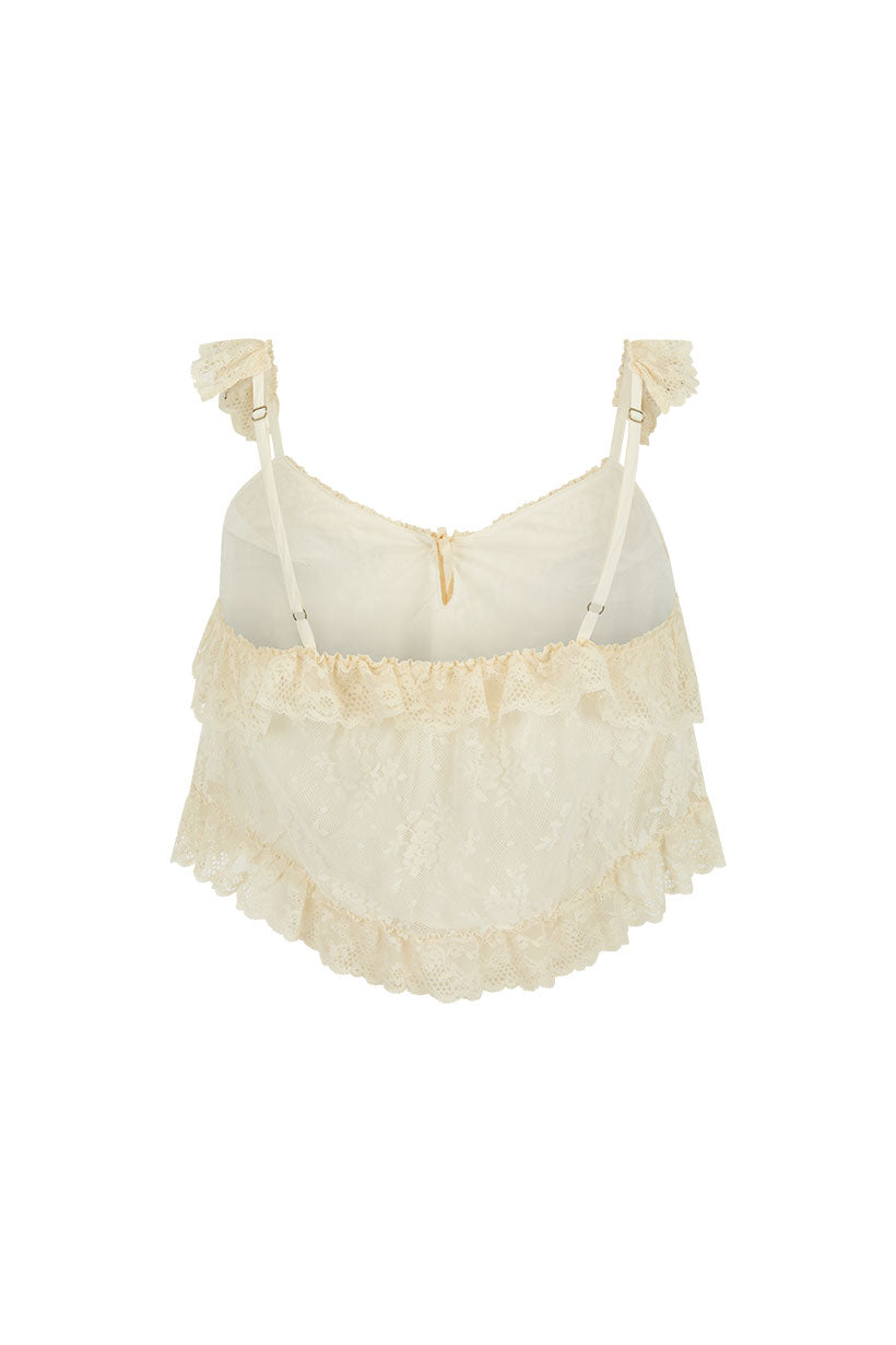 Cloud cream lace cami with ruffled layers, adjustable straps, and sheer recycled polyamide for lightweight layering.