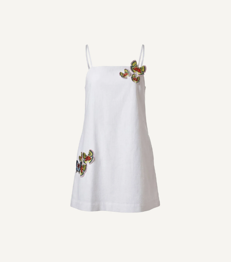White dress with colorful floral butterfly embroidery