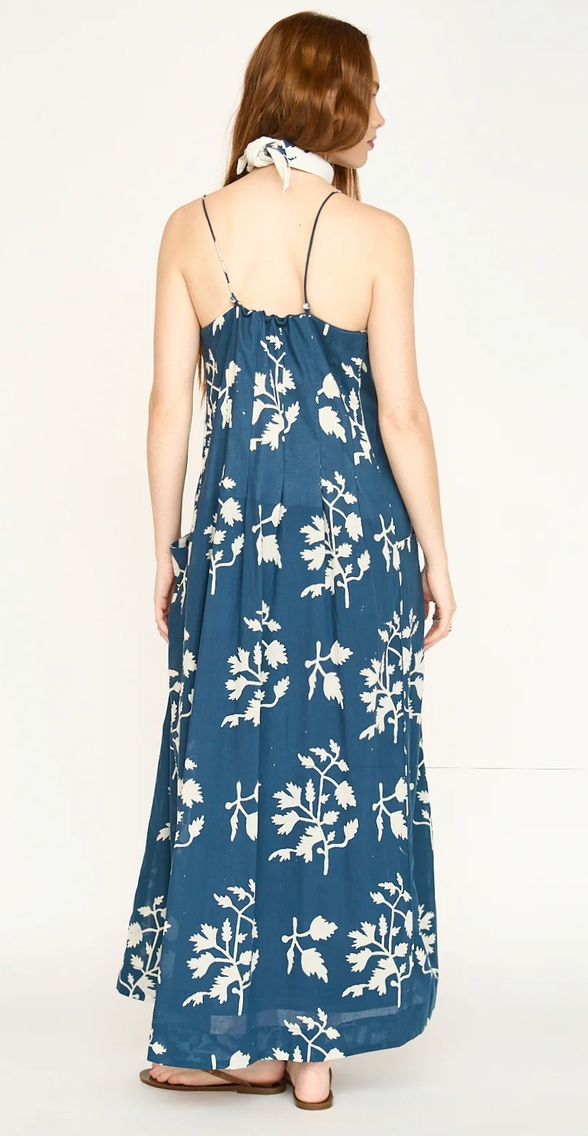 Woman in a navy blue floral dress
