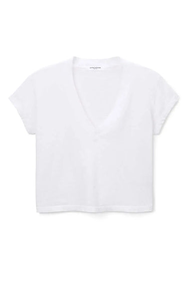 Woman in white v neck tee