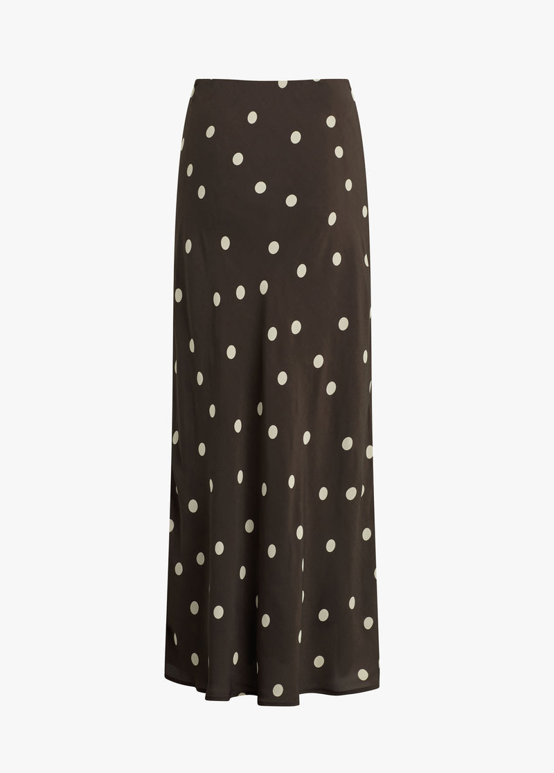 Dark brown polka dot skirt with white spots on lightweight fabric, suitable for everyday or casual wear. Displayed on white background.