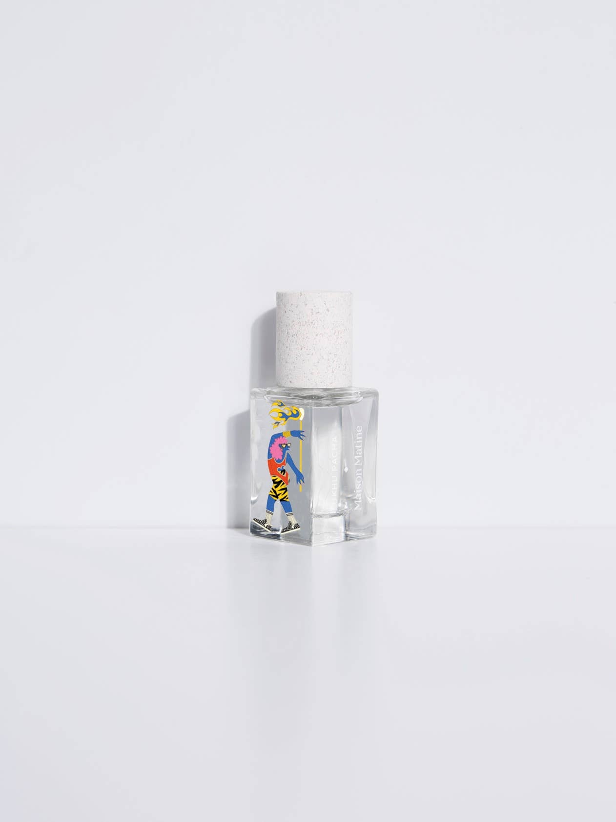 Maison Matine 15ml clear glass perfume bottle with a colorful cartoon label, Voyager Collection.