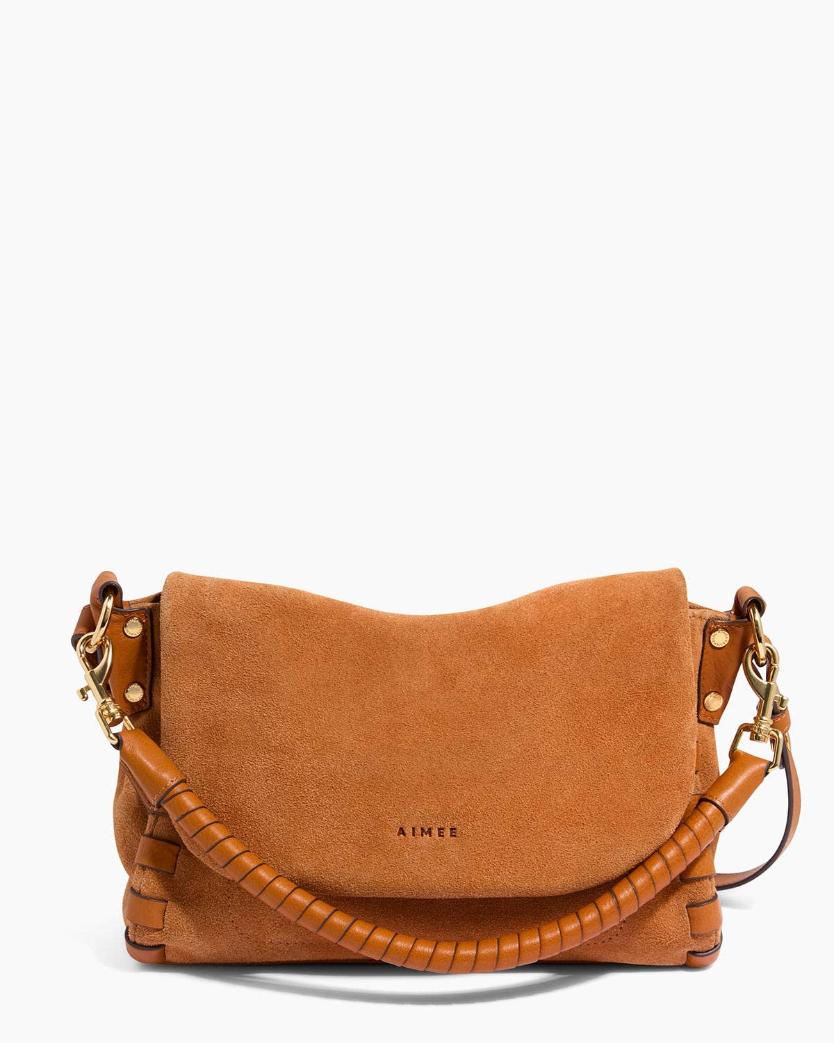 Tan suede convertible crossbody bag with curved flap, twisted handle, and front logo; can be worn two ways.