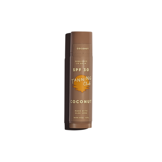 Brown tube of coconut lip balm with SPF 30, made of plastic, stands upright on a plain white background.