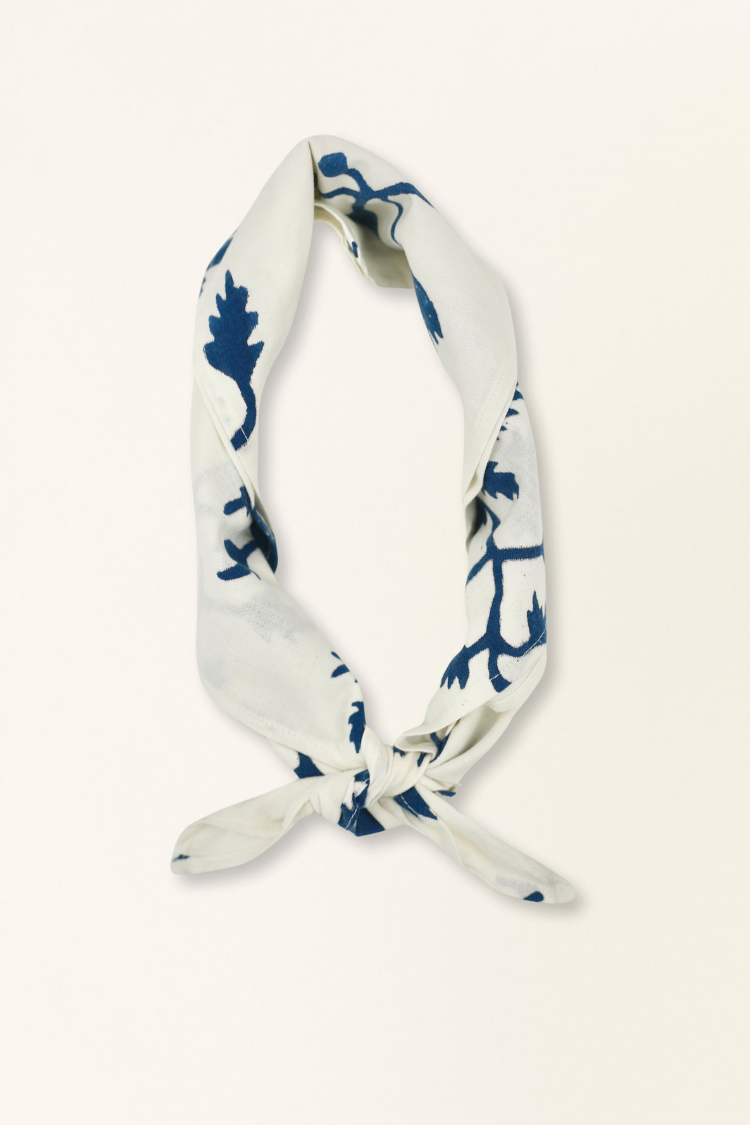 White cotton-silk bandana featuring blue botanical hand block prints from Bagru, India; ideal for accessorizing.