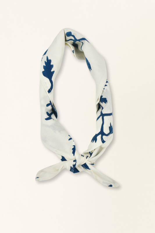 White cotton-silk bandana featuring blue botanical hand block prints from Bagru, India; ideal for accessorizing.