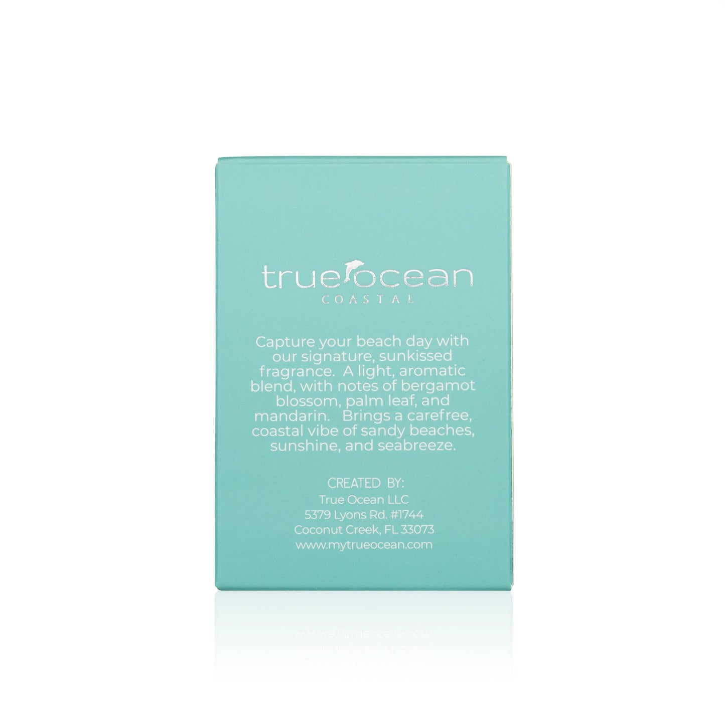 Turquoise cardboard box for True Ocean Perfume—Coastal, with scent details and contact info printed on the back.