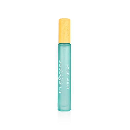 Turquoise body spray bottle with wooden cap, upright on a white background. Suitable for personal fragrance use.