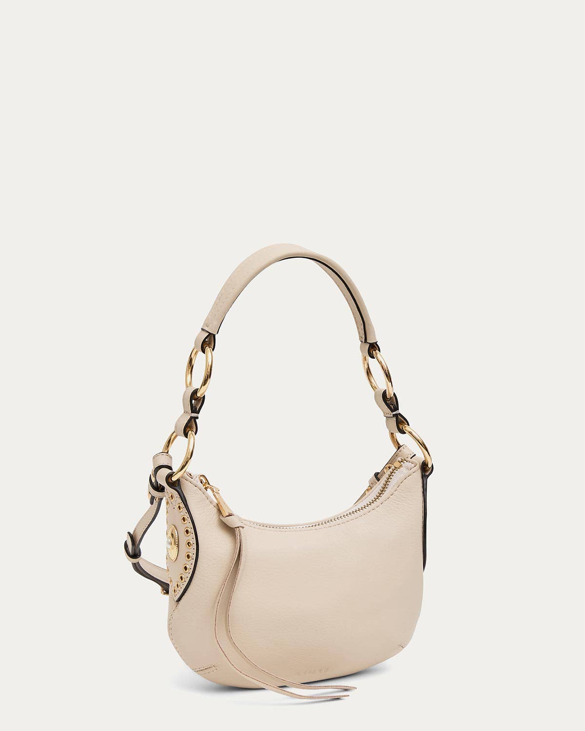 Beige mini crossbody bag with gold chain, short handle, and zip closure, suitable for everyday use.