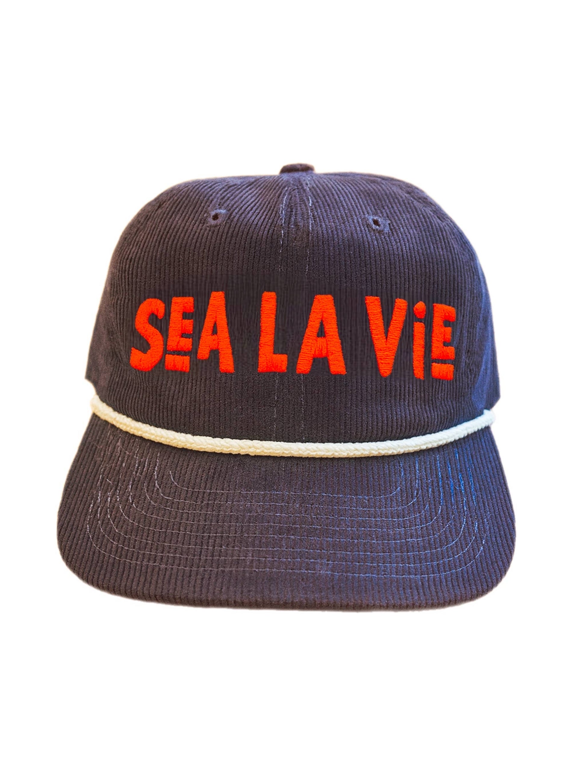 Red corduroy snapback hat with white rope detail and bold embroidered text. Suitable for casual outdoor wear.