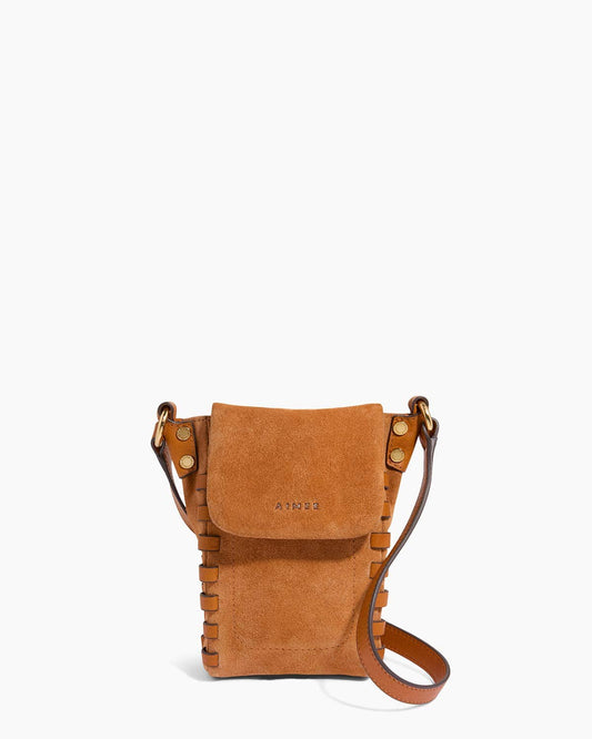 Tan suede leather crossbody phone bag with flap closure, stitched edges, and adjustable strap.