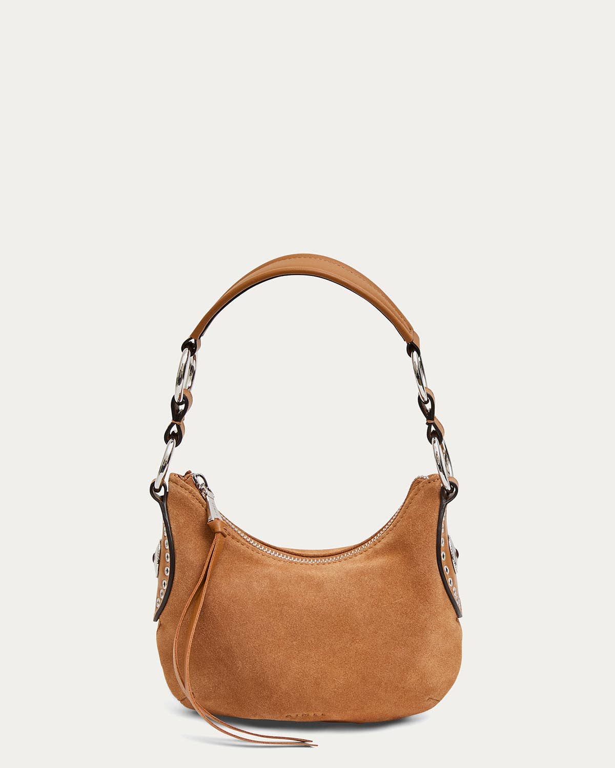 Latte suede mini crossbody with a bold strap and metal chain details, designed for everyday use.