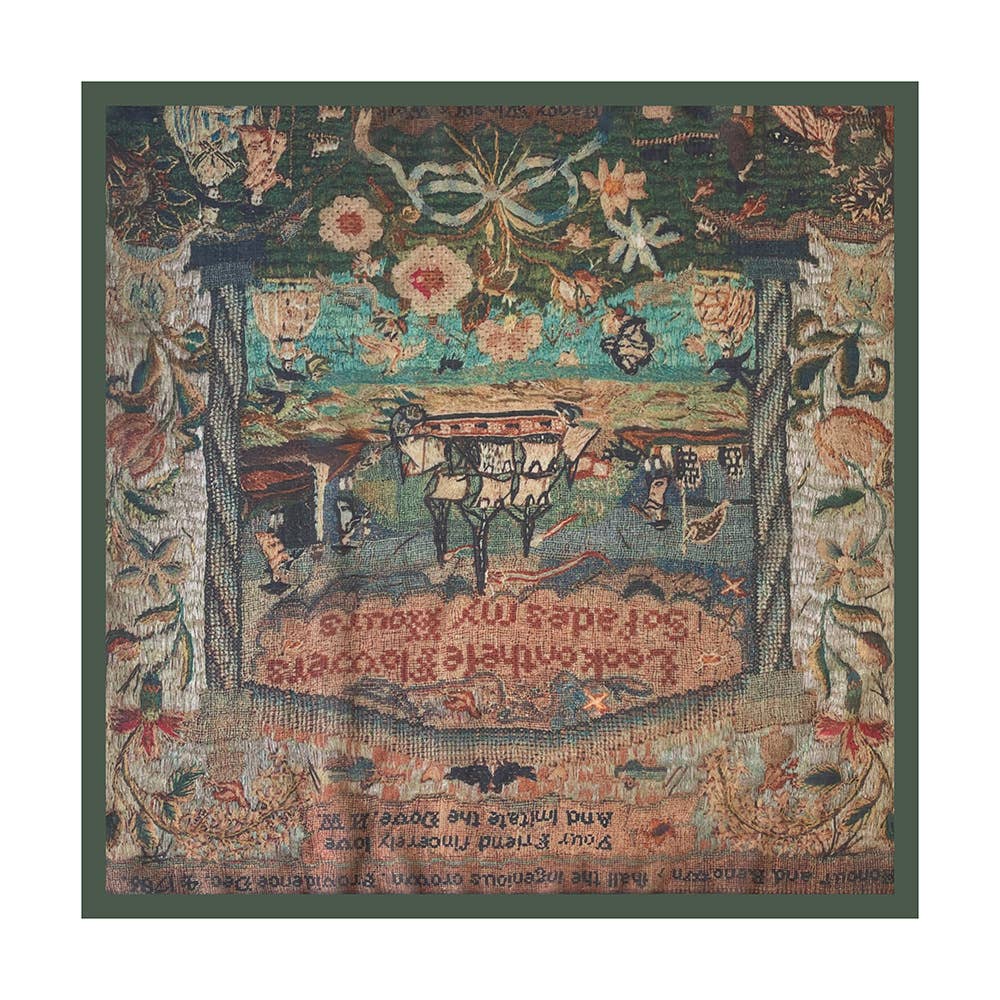 Vintage paisley patchwork bandana in multicolor fabric with cow, floral, and people motifs; ideal as a scarf or headwrap.