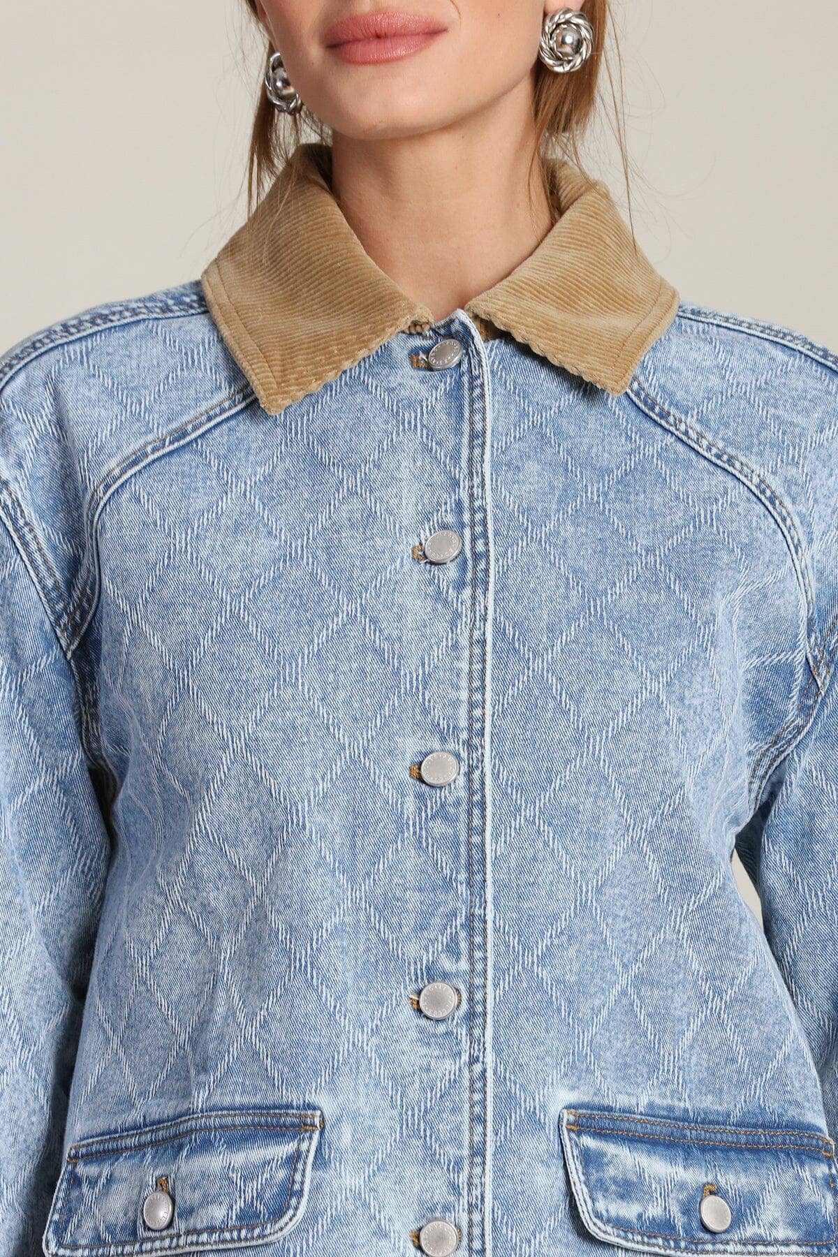 Light blue quilted denim barn jacket with tan corduroy collar; suitable for casual outerwear.