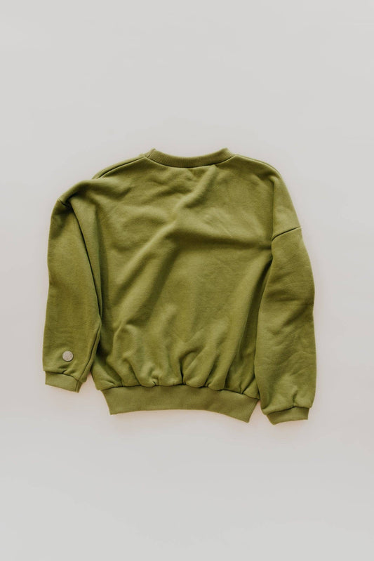 Green cotton sweatshirt with tiger patch, shown from the back, laid flat on a white surface.