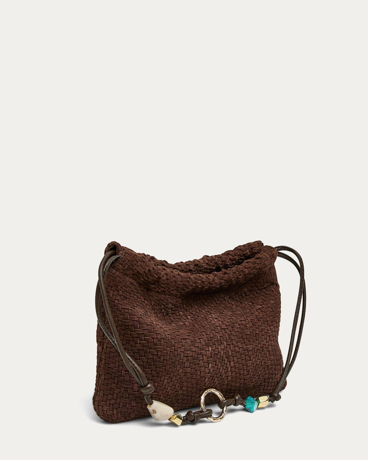Black handwoven leather shoulder bag with beaded details, drawstring closure, and matching leather straps.