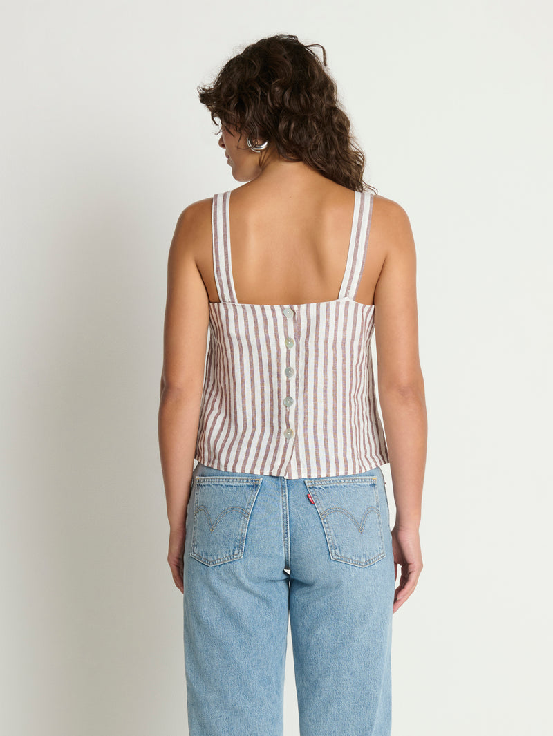 Woman wearing a striped tank top