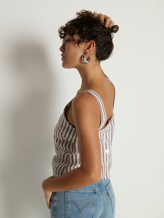 Woman wearing a striped tank top