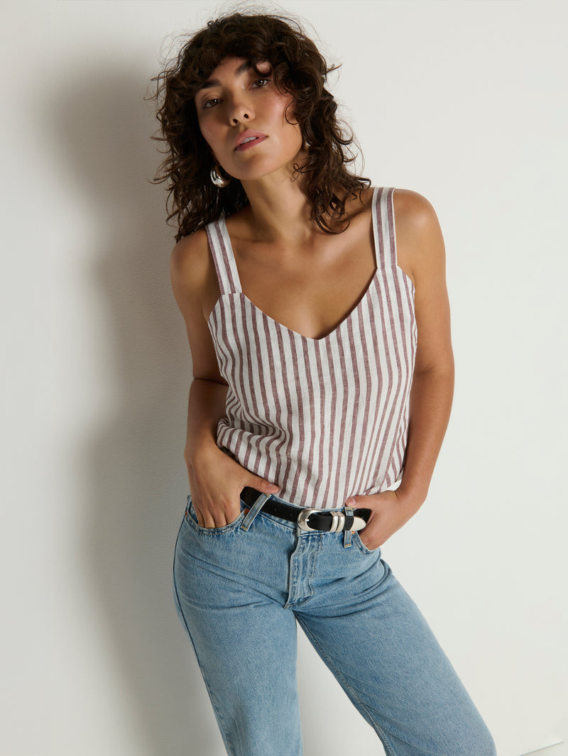 Woman wearing a striped tank top