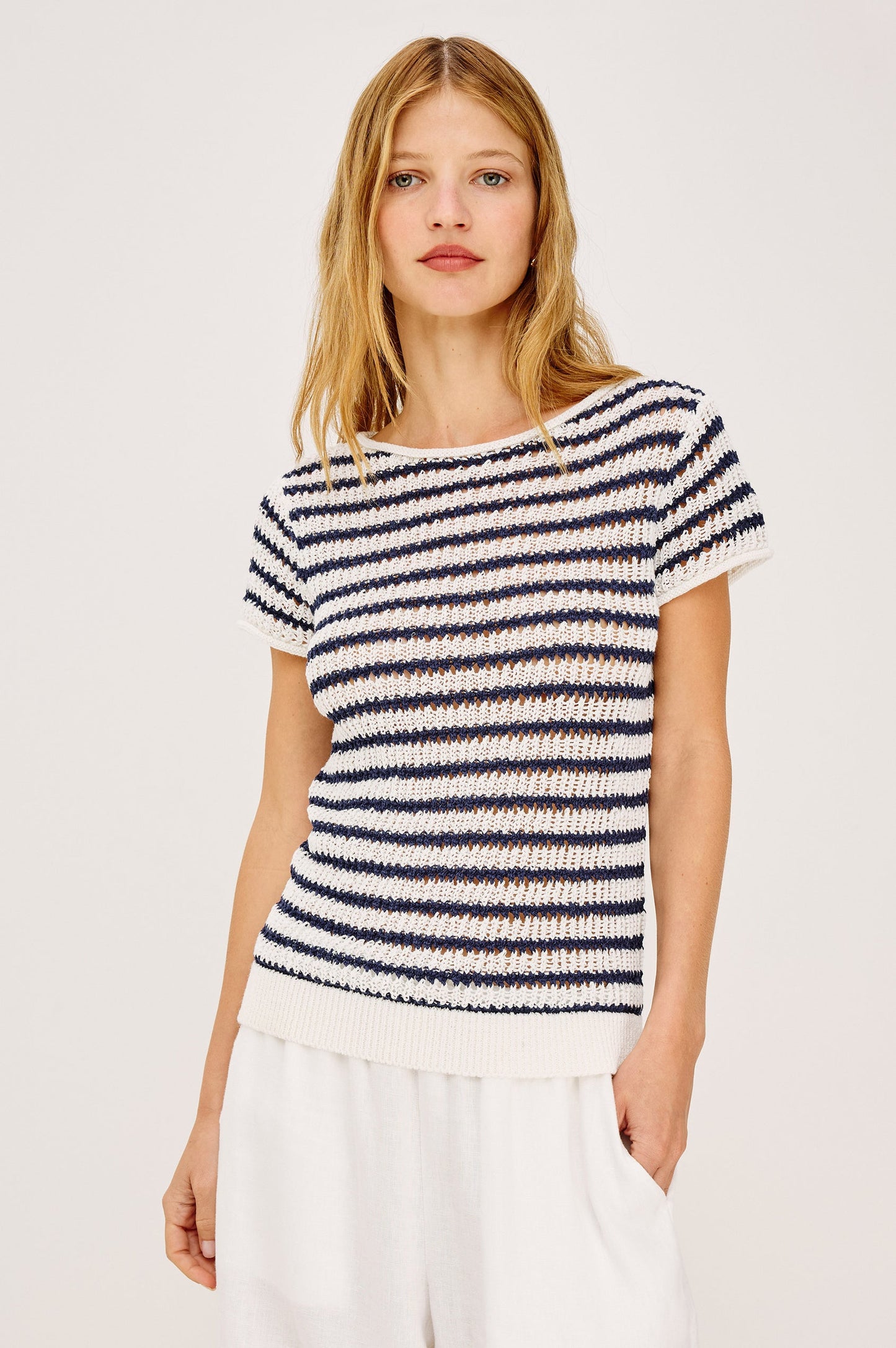 Woman wearing an indigo striped shirt 