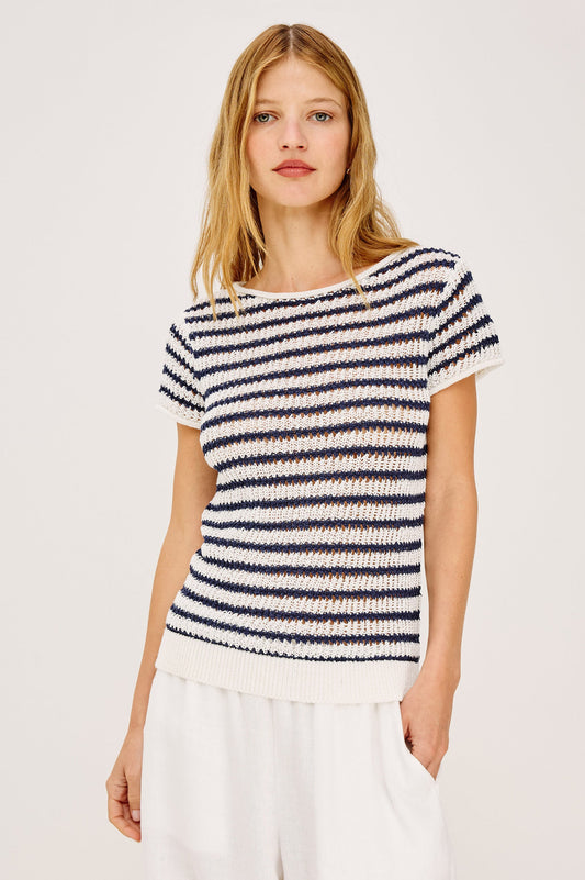 Woman wearing an indigo striped shirt
