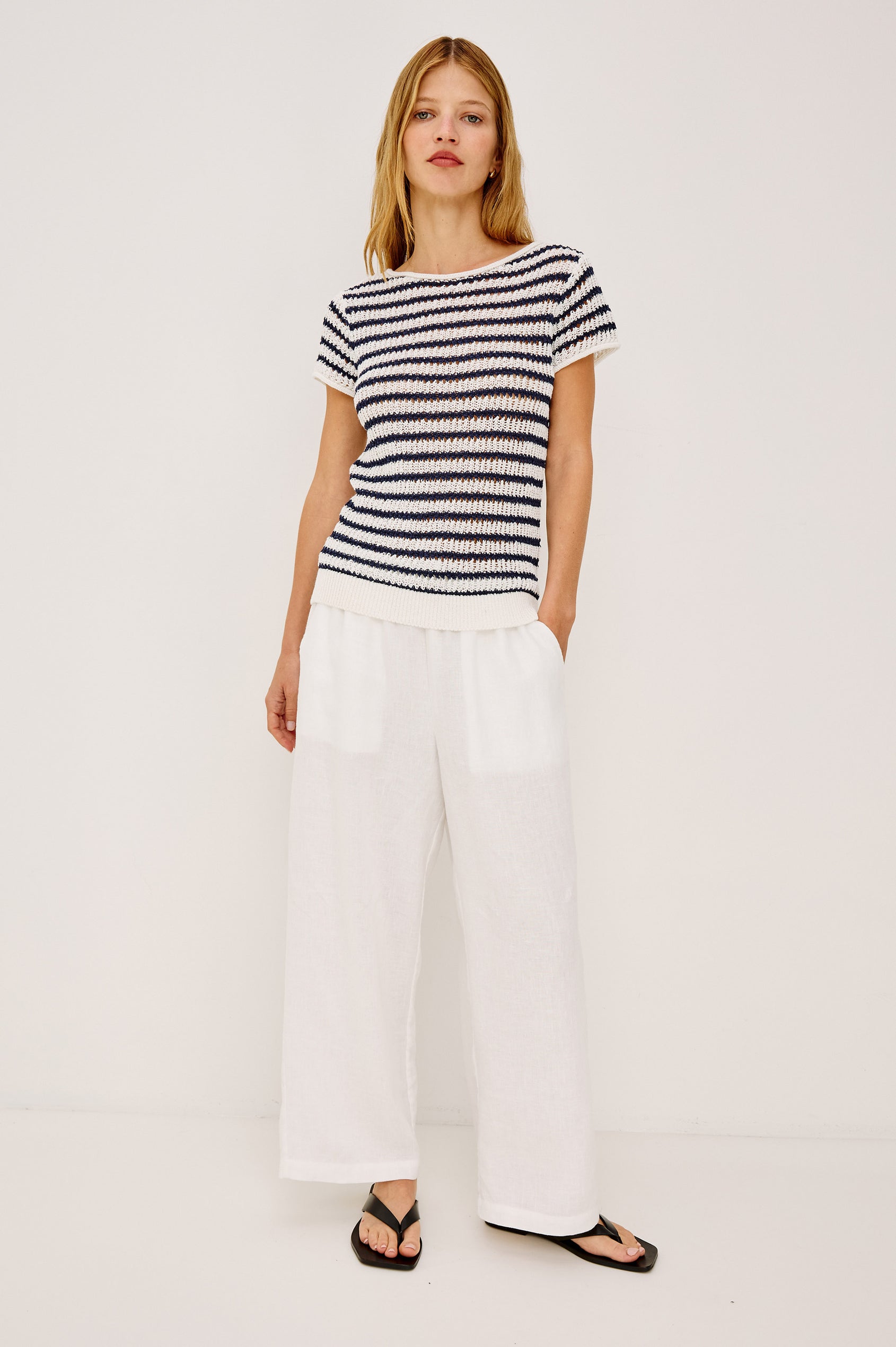 Woman wearing an indigo striped shirt 