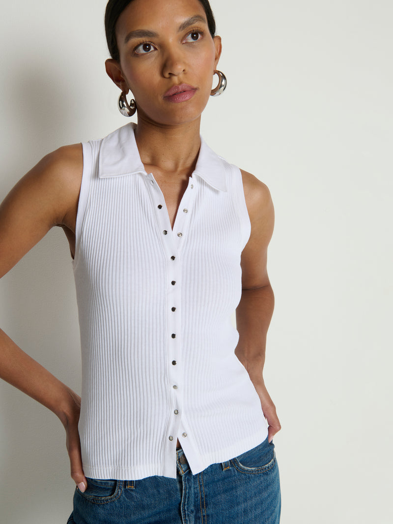 Woman in a white cotton polo shirt