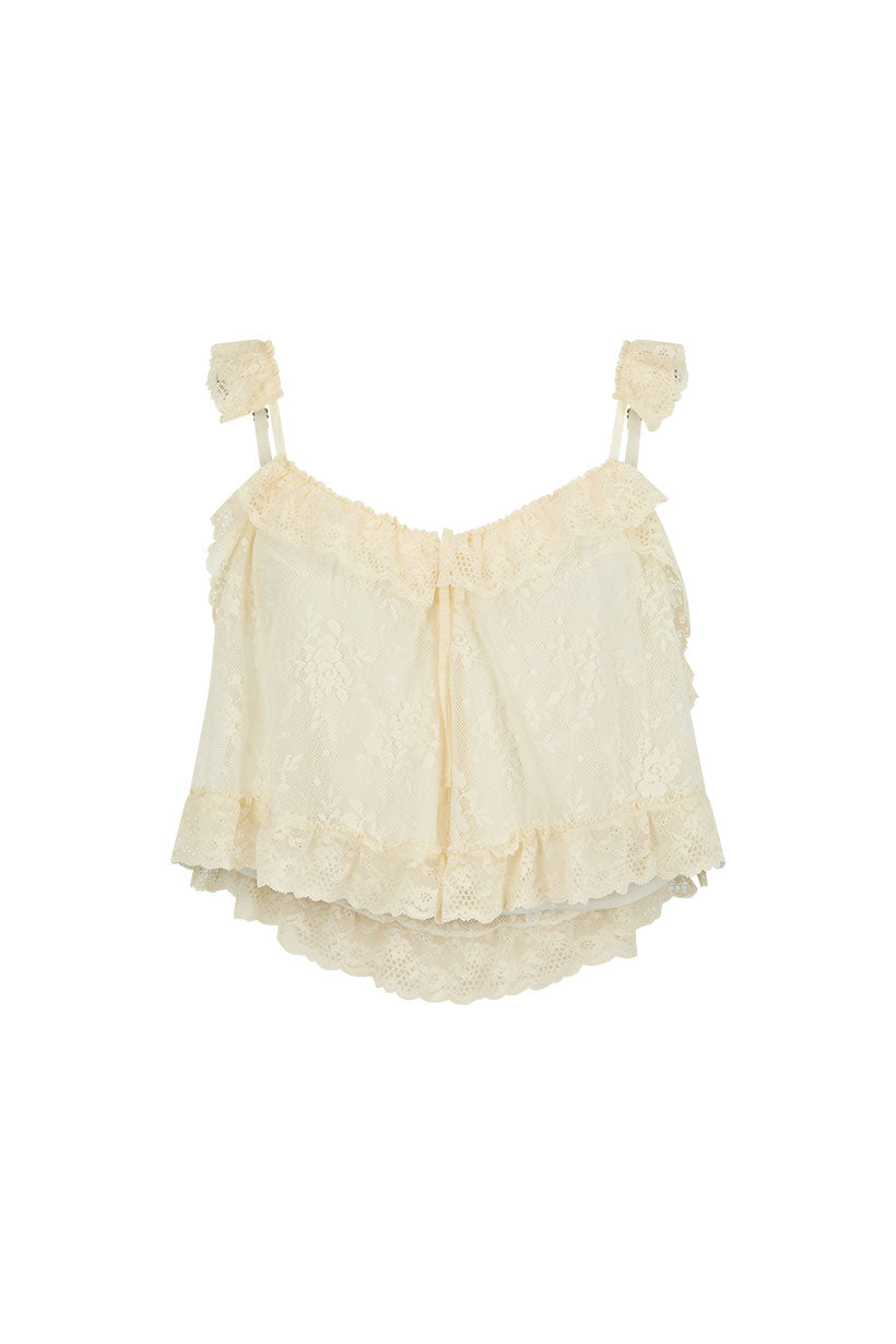 Cloud cream lace cami with ruffled layers, bows, and adjustable straps made from recycled polyamide.