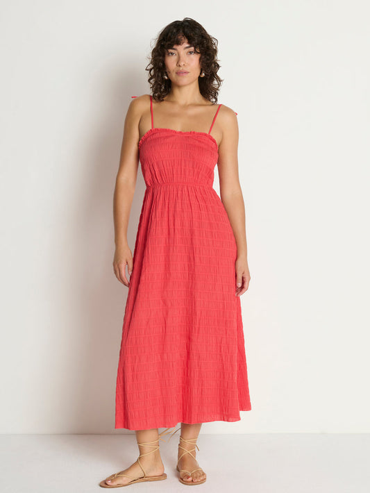 Woman in a red midi dress
