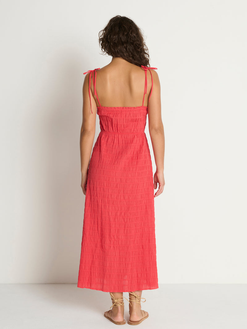 Woman in a red midi dress