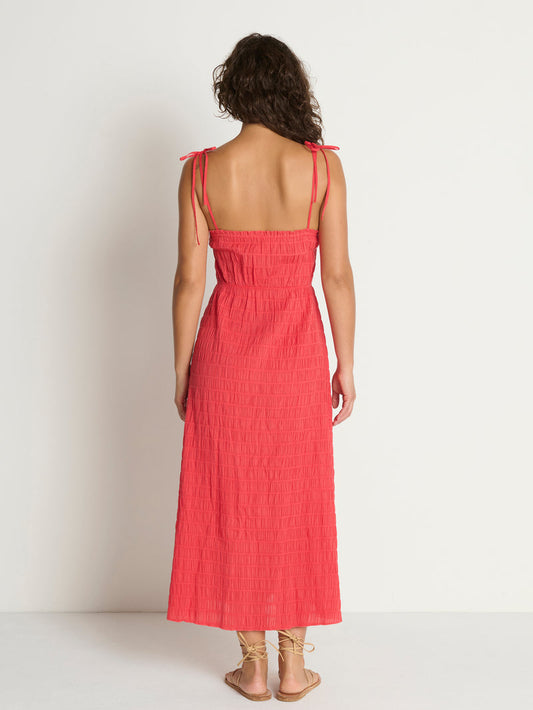 Woman in a red midi dress