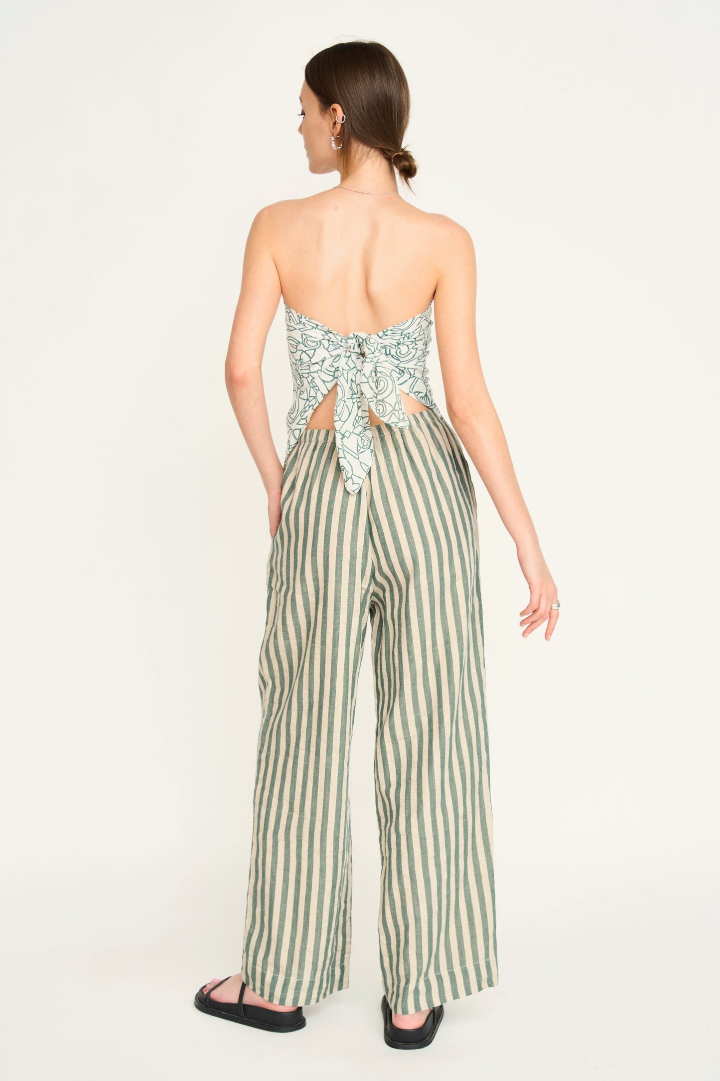 Woman wearing striped pants 