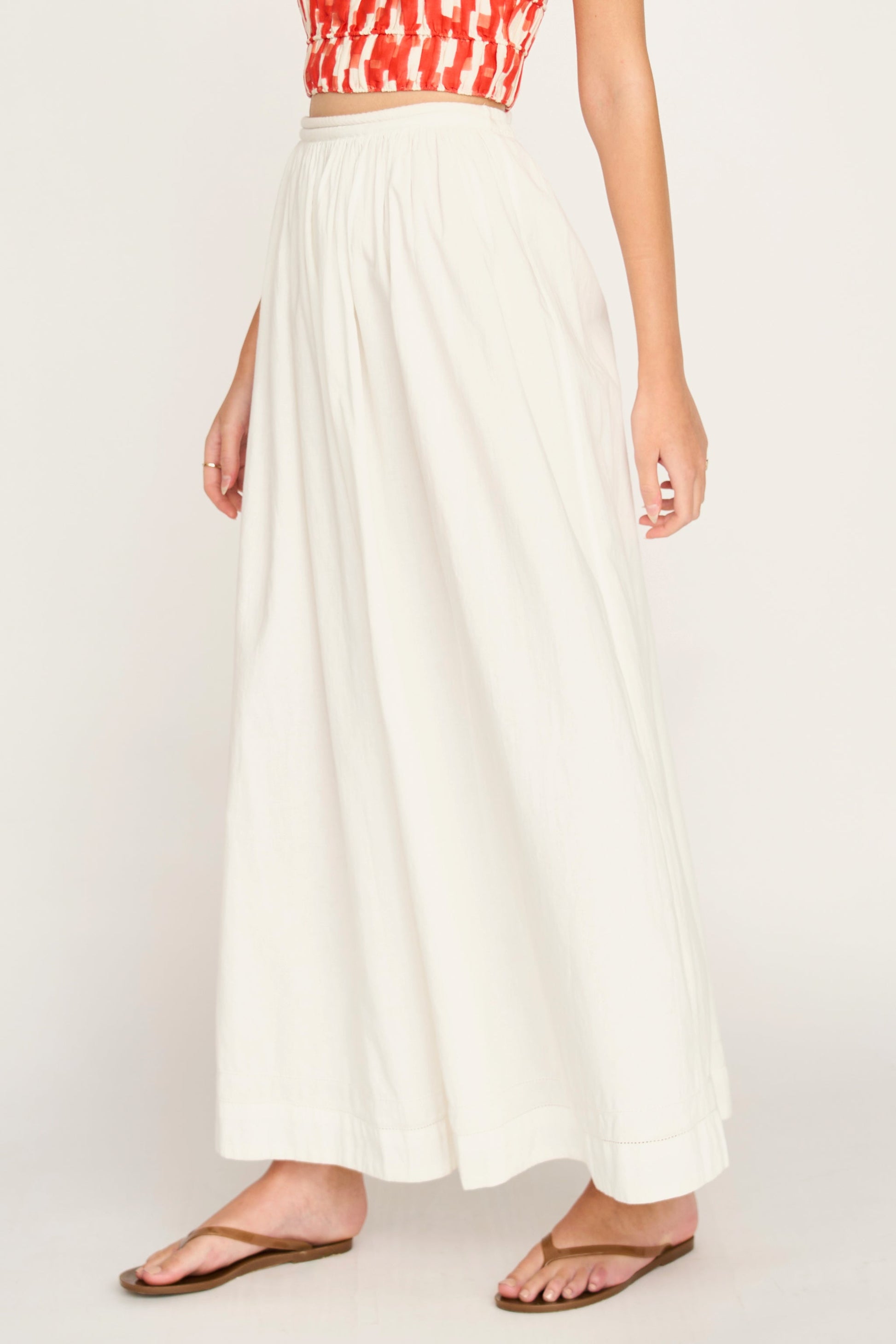 Woman wearing a white skirt
