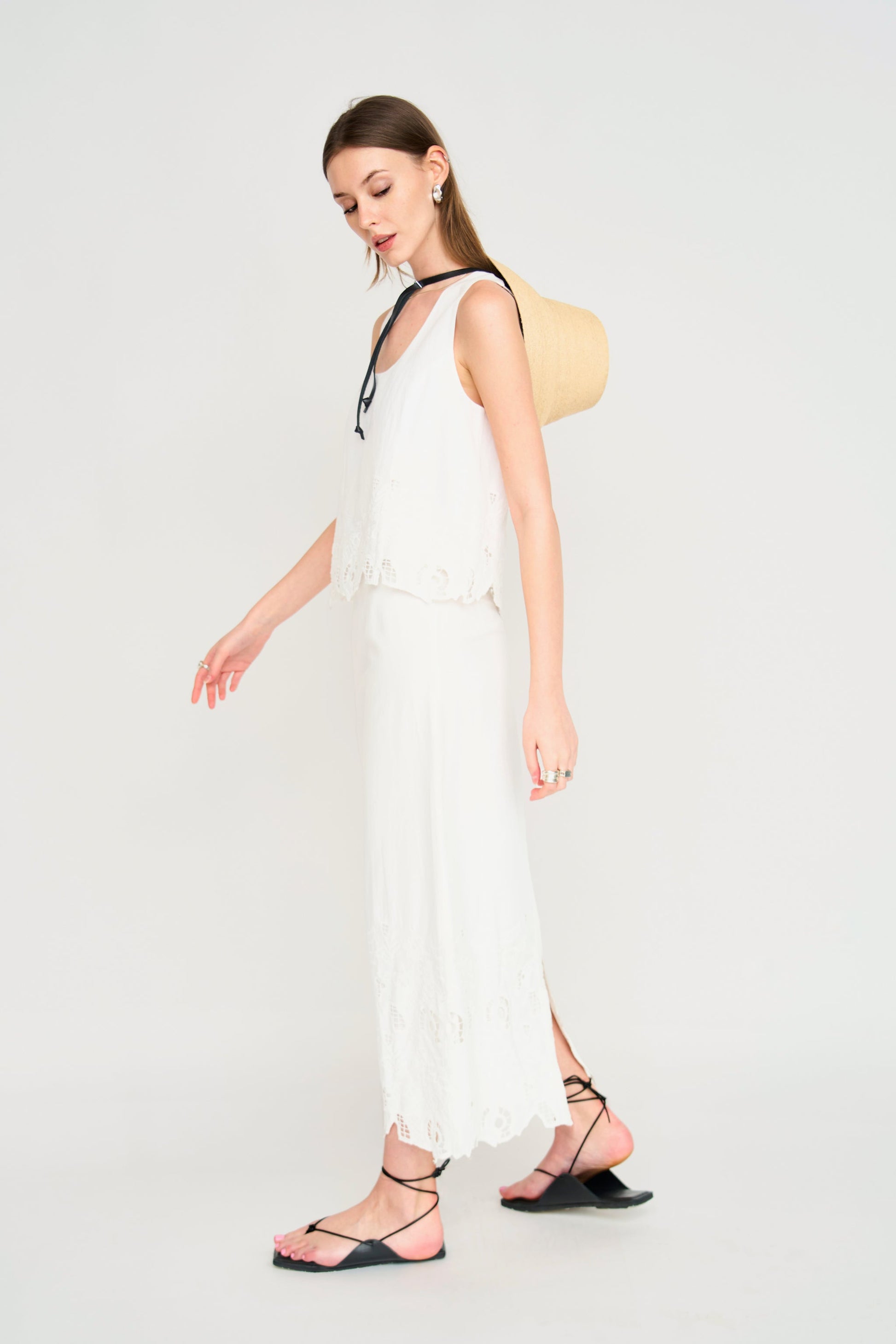 Woman in a white embroidered skirt
