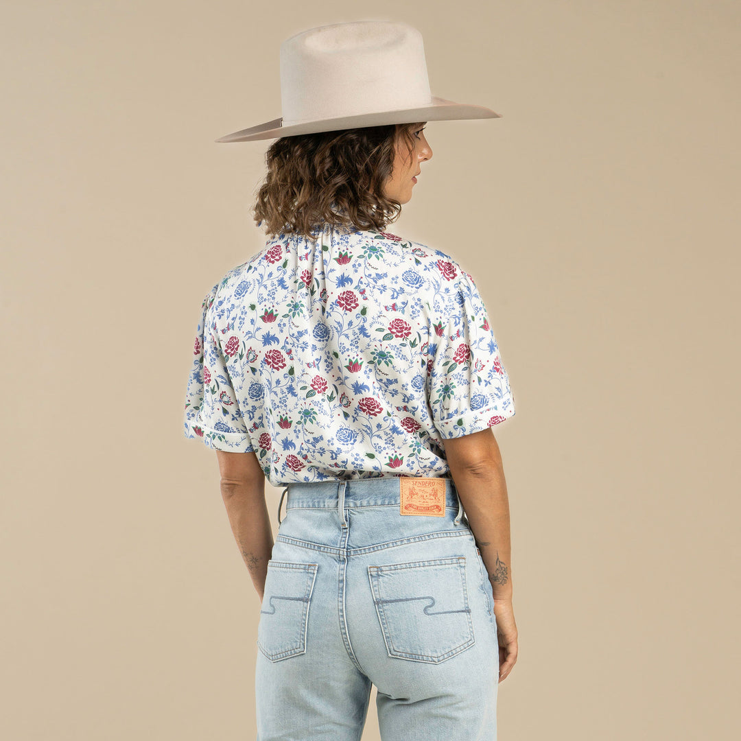 Woman wearing a floral shirt