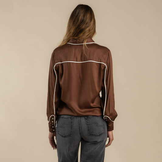 Back view of mocha-colored embroidered long sleeve shirt, shown on beige background. Suitable for casual or outdoor wear.