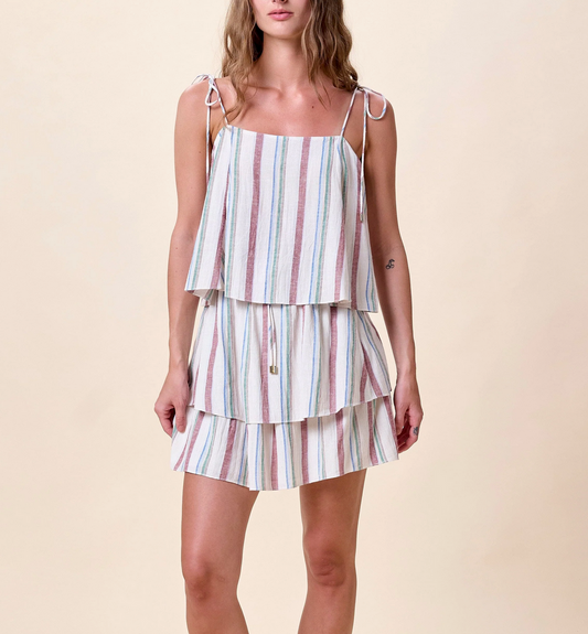 Woman wearing a striped top by Cleobella