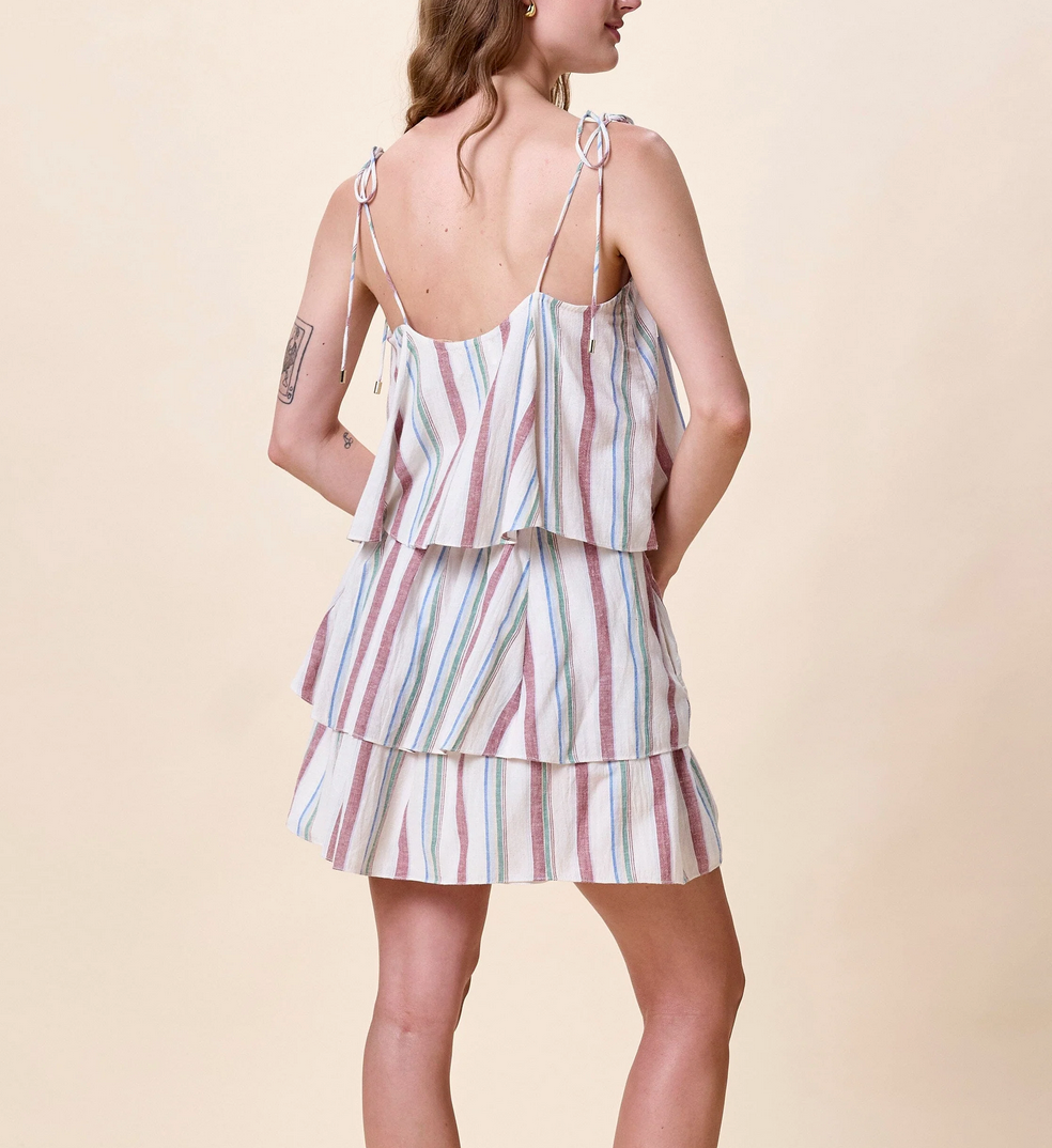 Woman wearing a striped top by Cleobella