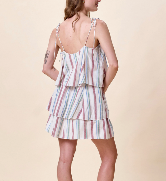 Woman wearing a striped top by Cleobella