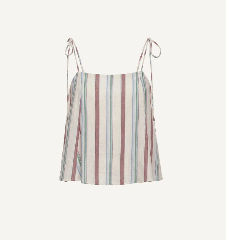 Woman wearing a striped top by Cleobella