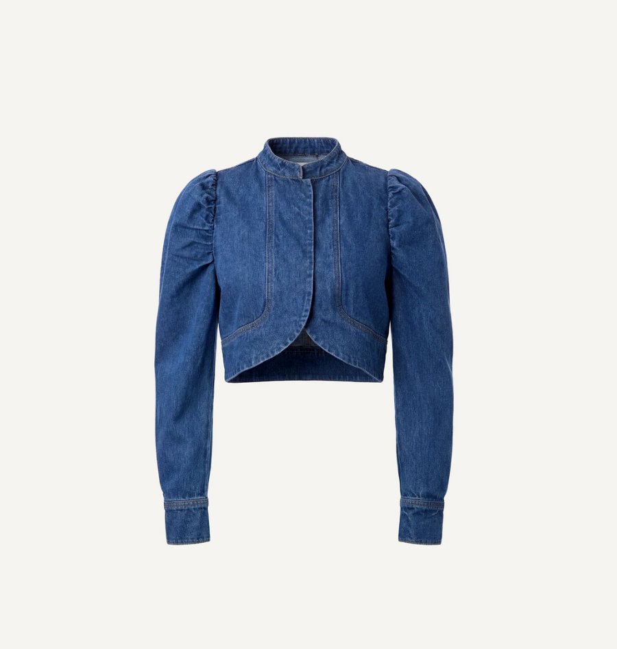 Medium blue denim jacket with puffed long sleeves and stand-up collar, displayed on a white background.