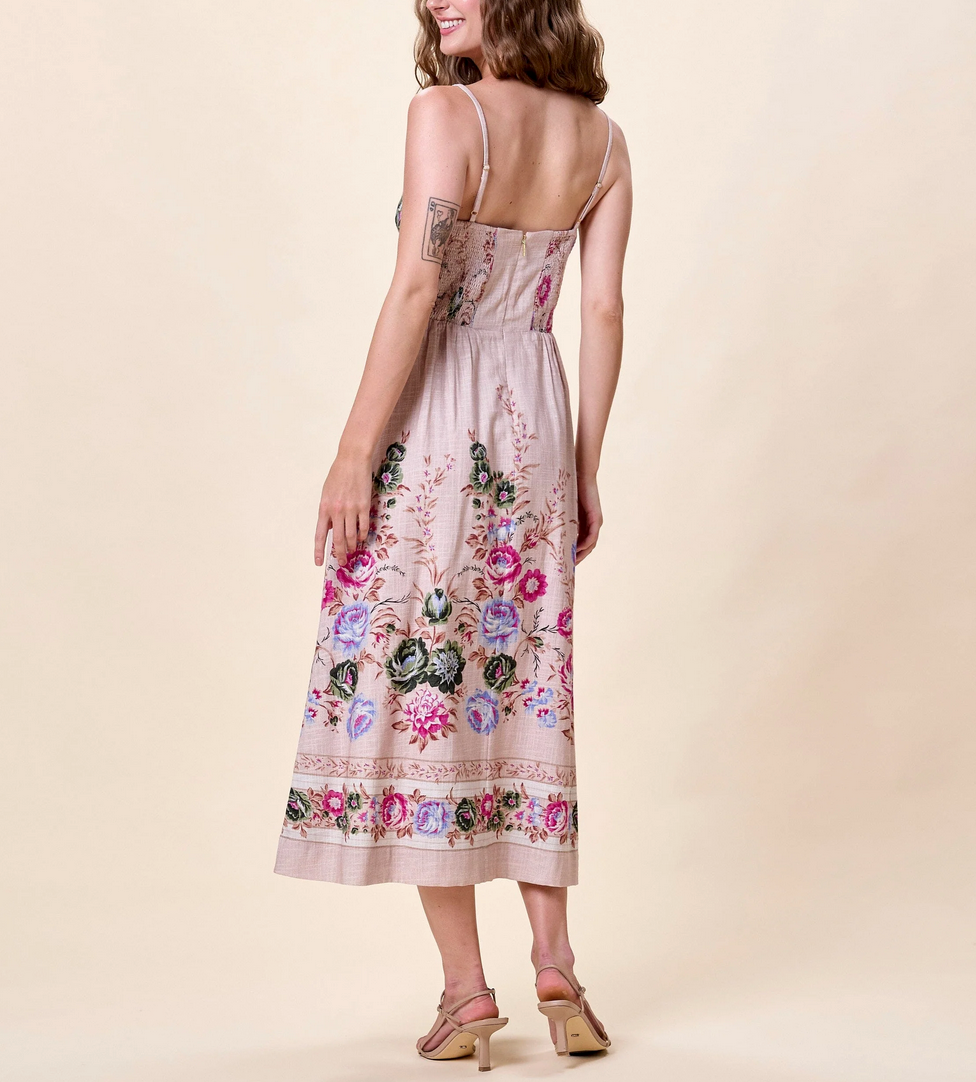 Back view of ankle-length floral embroidered dress in silva shade, displayed on a neutral background.