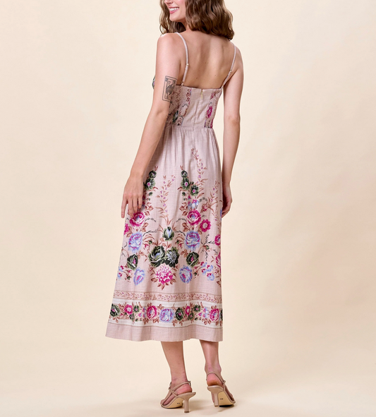 Back view of ankle-length floral embroidered dress in silva shade, displayed on a neutral background.