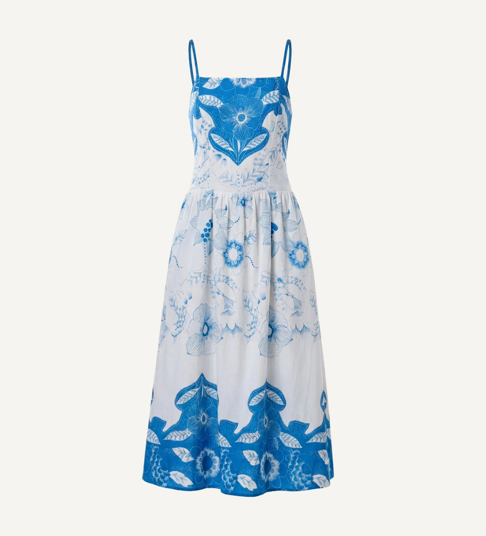 Blue and white floral dress on a white background
