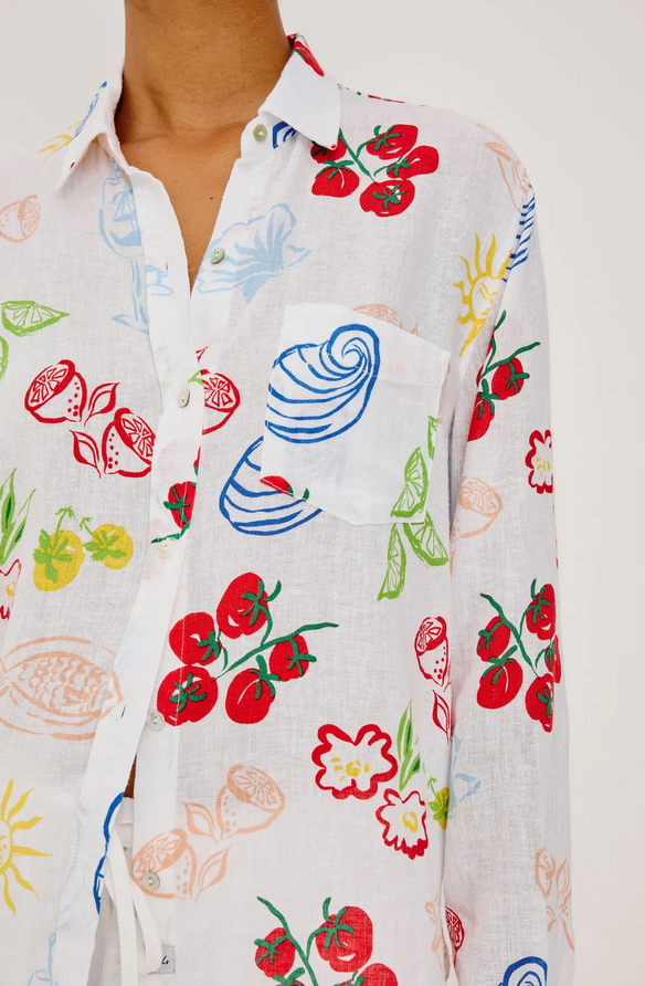 White blouse with colorful fruit and vegetable patterns 