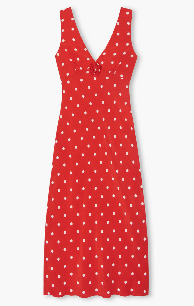 Woman wearing a red polka dot dress
