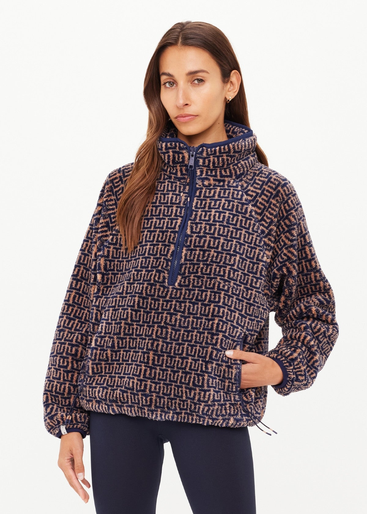 Woman wearing a patterned pullover 