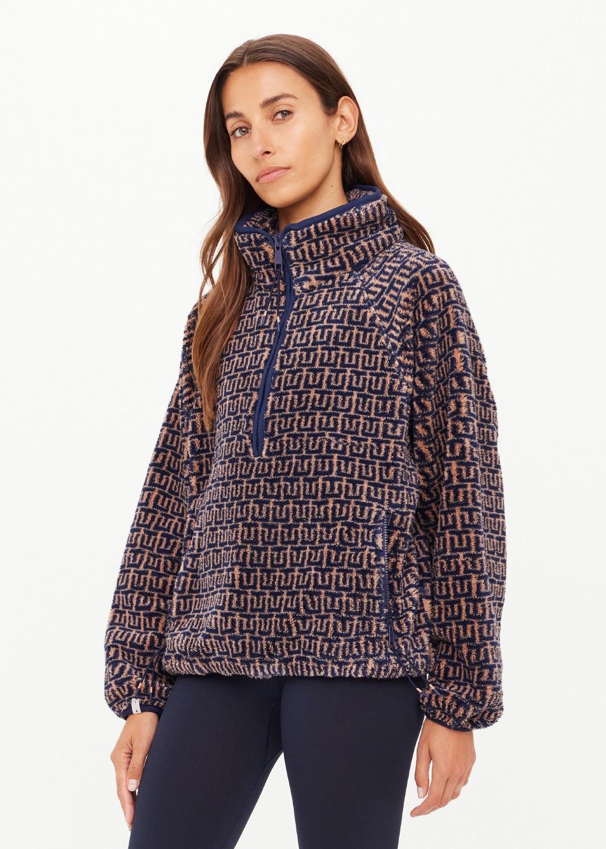 Woman wearing a patterned pullover 