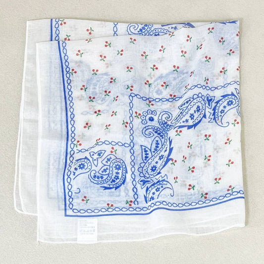 White cotton bandana folded to display floral and paisley print, suitable for headwear or accessory use.