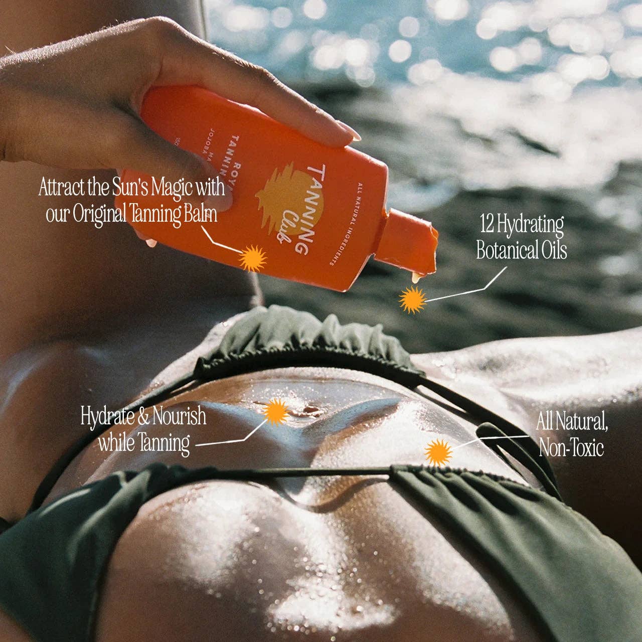 Woman in bikini applies white tanning balm with UV-blocking botanicals, sitting by the water.